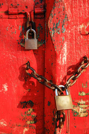 vintage lock on red wooden door