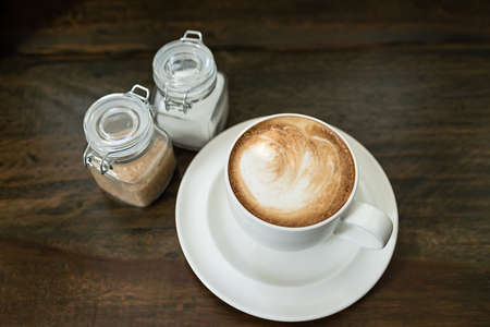 hot coffee on a wooden tableの写真素材