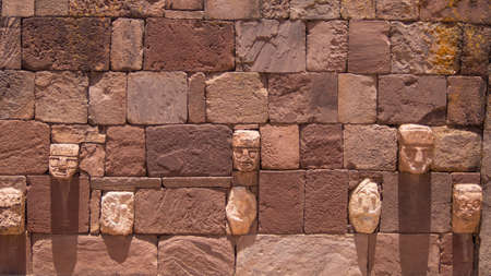 Front view. Ruins of the ancient city of Tiwanaku, Bolivia, facesの写真素材