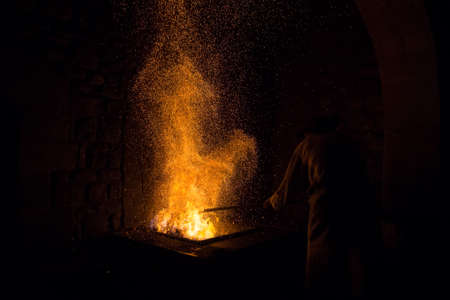 Blacksmith forging in the traditional way, as in the past, in the Legazpi smithy