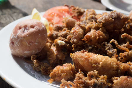 Fried chopitos, typical dish of Spanish food. Chopitos de lanzarote with crumpled potatoes. Canary...