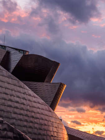 Bilbao riverside near Guggenheim Museum during the sunset, view from La salve bridgeのeditorial素材