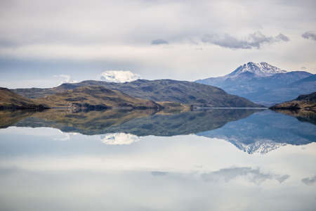 Mirror reflection on Lake NordenskjÃ¶ld in Torres del Paine National Park, Chilean Patagonia