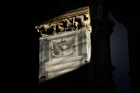 Detail of the paintings in a church of Parma with a ray of light on themの写真素材