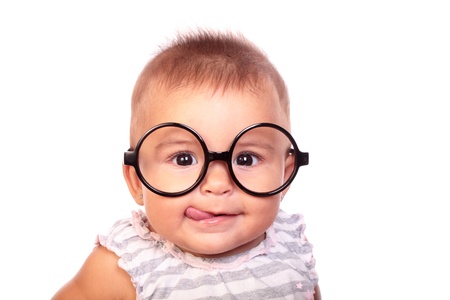 portrait of a beautiful baby with glassesの写真素材