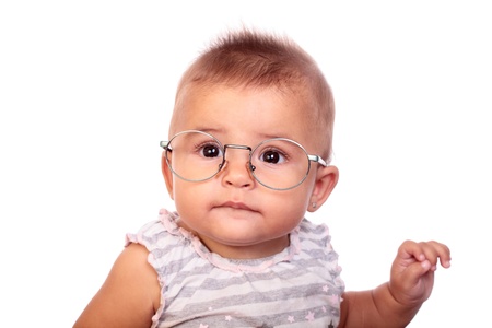 portrait of a beautiful baby with glassesの写真素材