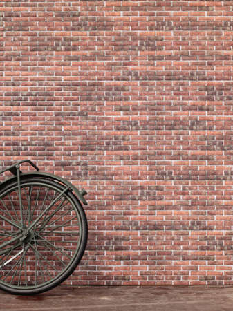 abandoned cycle on a brick wallの写真素材
