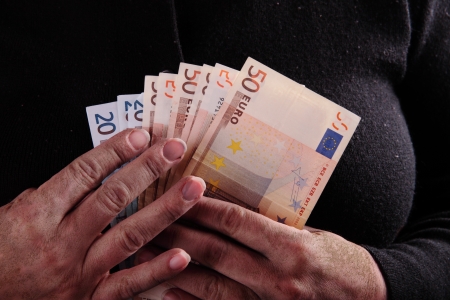 dirty hand and moneyの写真素材