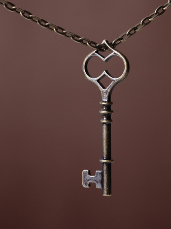 picture of an old keys on a brown background
