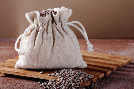 burlap sack full of lentilsの写真素材