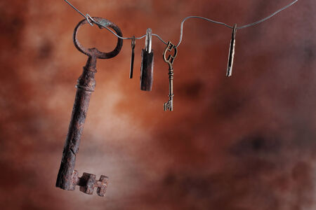 picture of an old keys on a brown backgroundの写真素材
