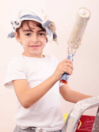 caucasian boy painting and smilingの写真素材