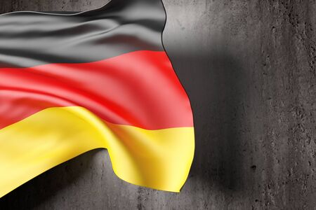 3d rendering of a german flag on a concrete wallの写真素材