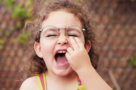 beautiful caucasian girl with glassesの写真素材