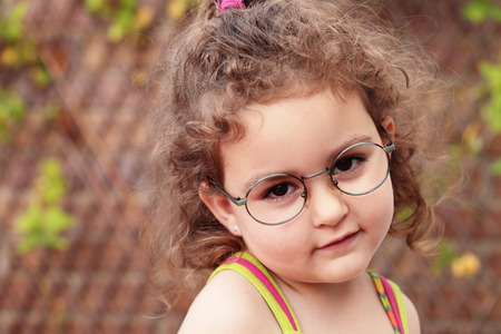 beautiful caucasian girl with glassesの写真素材