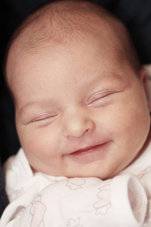portrait of a beautiful baby smilingの写真素材
