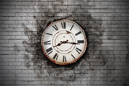 3d rendering of an old clock on a brick wallの写真素材