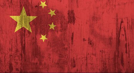 Old and dirty textured China flagの写真素材