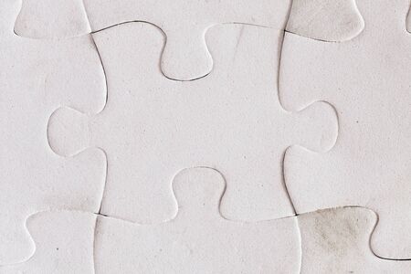 Some pieces of a white puzzleの写真素材