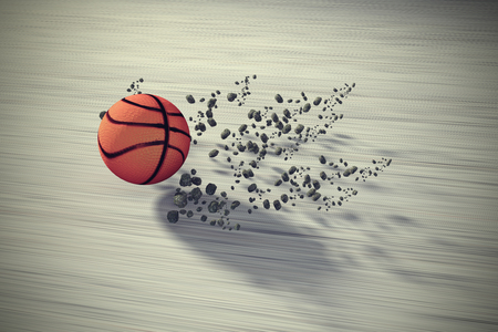 3d rendering of a fast rolling basketball on floorの写真素材