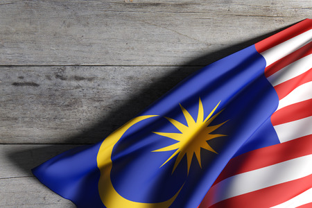 3d rendering of Malaysia flag waving on wooden backgroundの写真素材