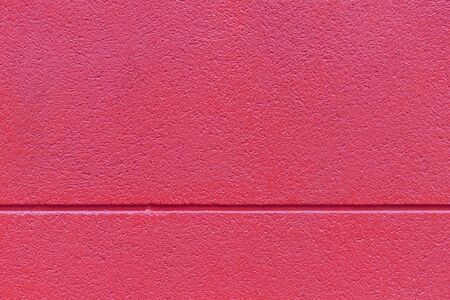 Shot of red textured wall background.の写真素材