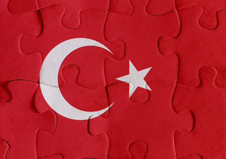 Illustration of a flag of Turkey over some puzzle pieces. Its a JPG image.の写真素材