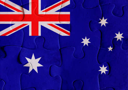 Illustration of a flag of Australia over some puzzle pieces. Its a JPG image.の写真素材