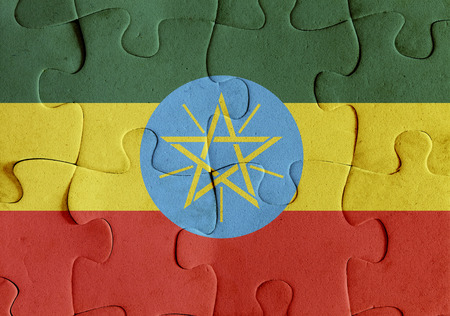 Illustration of a flag of Ethiopia over some puzzle pieces. Its a JPG image.の写真素材