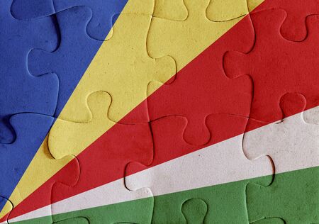Illustration of a flag of Republic of Seychelles over some puzzle pieces. Its a JPG image.の写真素材