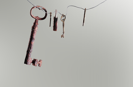 picture of an old keys on a grey backgroundの写真素材