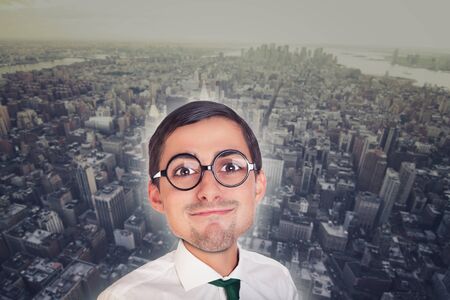 Portrait of a young cartoon and caricature executive with the city on backgroundの写真素材