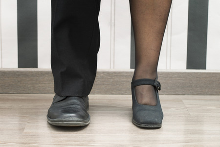 Concept of executive man and woman.. Foot of an executive man and woman.Horizontal shot. Studio shot.の写真素材