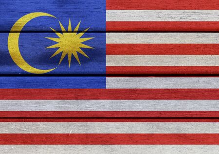 Illustration of Malaysia flag over a wood surfaceの写真素材