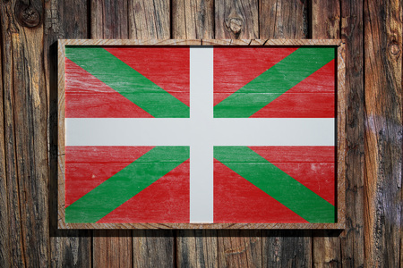 3d rendering of a Basque Country flag on a wooden frame and a wood wallの写真素材