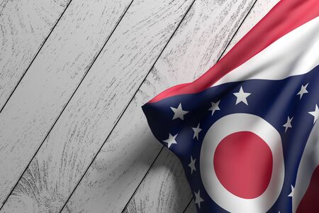 3d rendering of an American Ohio State flag on a wooden surfaceの写真素材