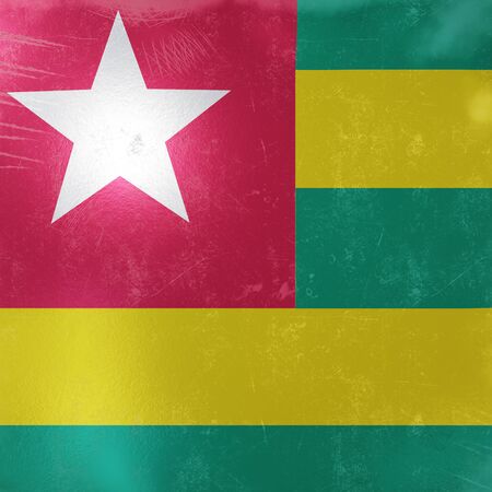 3d rendering of a rusty and old Togo flag on a metallic surface. の写真素材