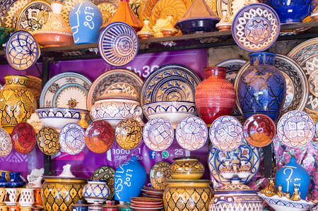 Moroccan pottery shop in Assilah, a town in the north of Morocco located on the coast just 45 kilometers from Tangier. Photograph taken in October 2016 inside the Kasbah in the city of Assilah also called Arcila.の写真素材