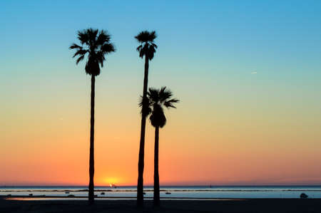 Sunset Sanlucar de Barrameda in Cadiz. Photo taken at the beach of the Piletas at the mouth of the...