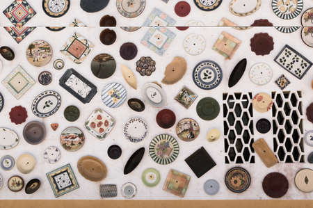 Side of a ceramic shop in the middle of the road parallel to the Portuguese Algarve coast.の写真素材