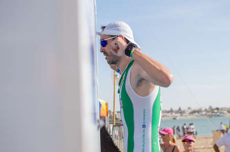 Athletes finish running this extreme triathlon on the beach of the Do? ? ana National Park. In theのeditorial素材