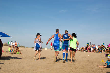 Athletes finish running this extreme triathlon on the beach of the DoÃ ± ana National Park. In theのeditorial素材