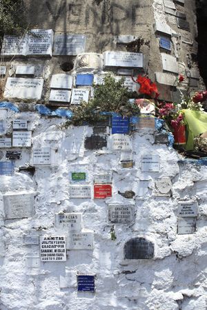 Valparaiso, Chile - December 06, 2009: Animita (Roadside shrine) in Valparaiso, Chile. Plaques in appreciation and gratitude.のeditorial素材