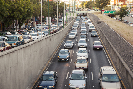 Mexico City, Mexico - May 30, 2012: Cars in high traffic in Viaducto Avenue, at rush hour.