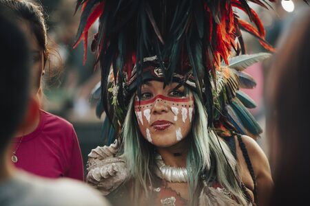 Mexico City, Mexico - December 22, 2017: Aztec dancers dancing in the Zocalo in Mexico City, DF,...