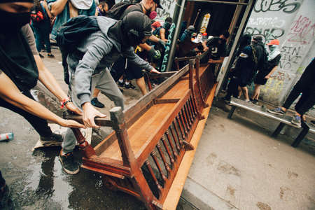 SANTIAGO, CHILE-NOVEMBER 8, 2019 - Protesters loot the church