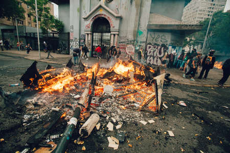 SANTIAGO, CHILE-NOVEMBER 8, 2019 - Protesters barricade with looted furniture from theのeditorial素材