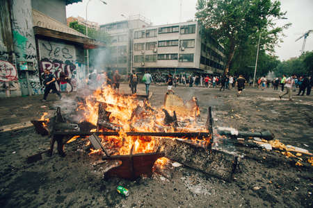 SANTIAGO, CHILE-NOVEMBER 8, 2019 - Protesters barricade with looted furniture from theのeditorial素材