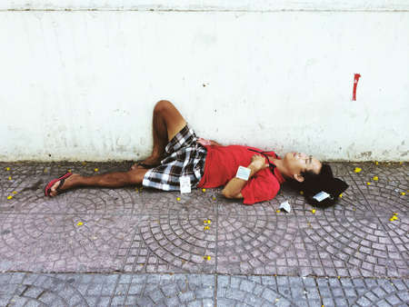 Poor man sleeping on the streetのeditorial素材