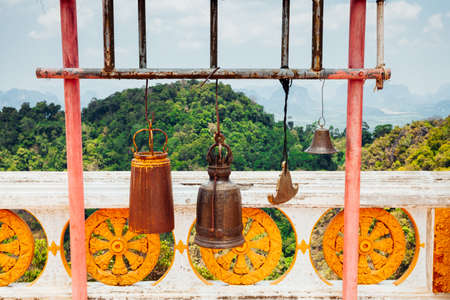 Buddhist bells at Tiger Cave Temple. Krabi, Thailand.の写真素材